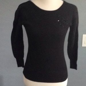 Black sweater with fun detail